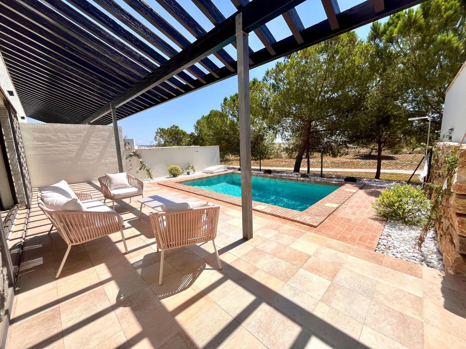 Elegantes adosados de una planta con piscina privada en Pera
