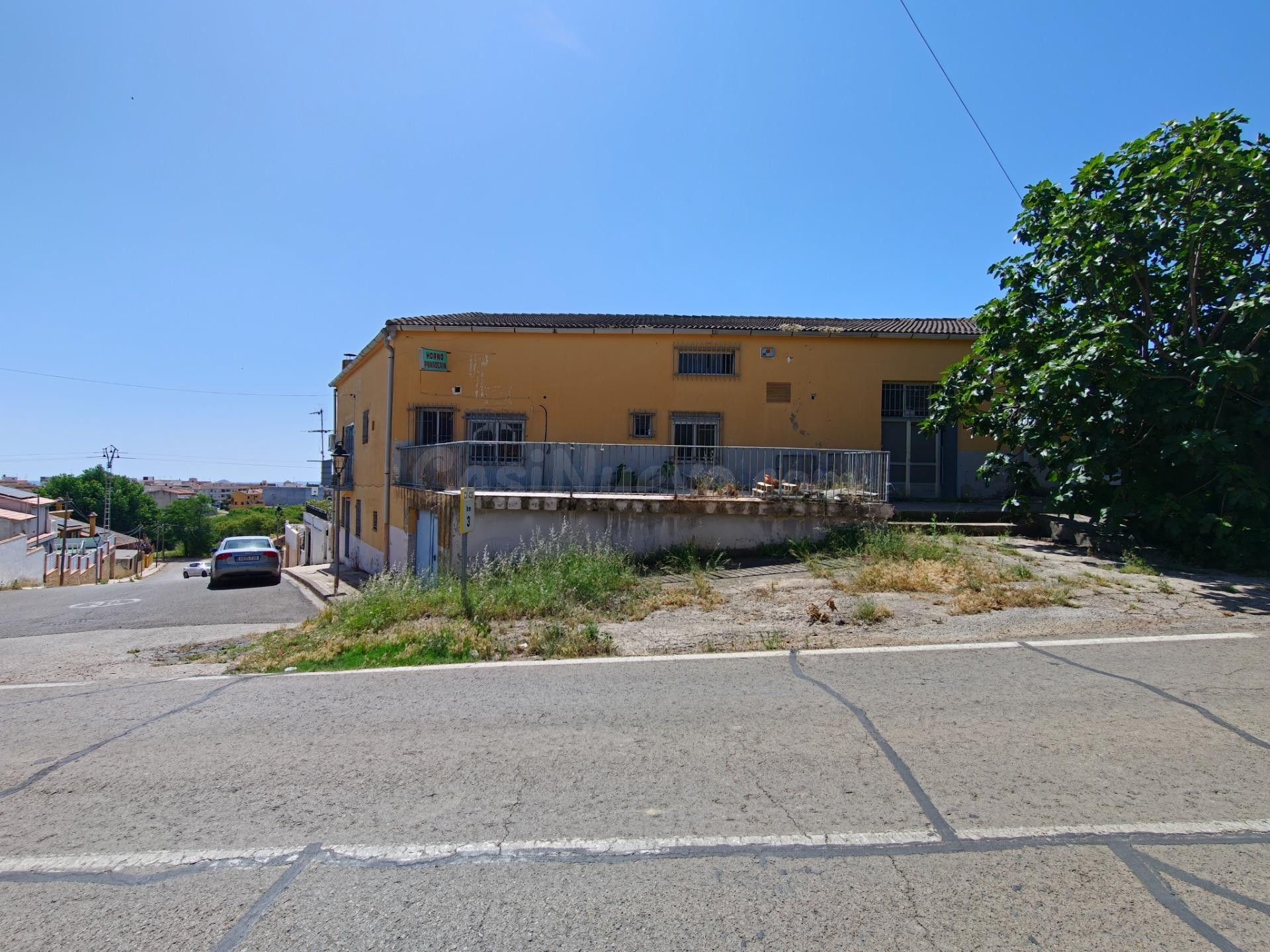 Casa con local comercial - foto 2