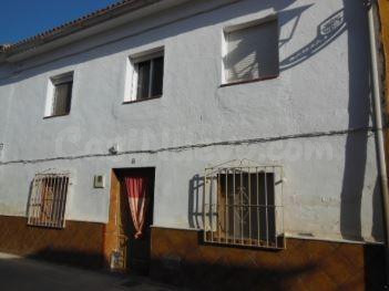 Se vende casa adosada OKUPA en Calle Vuelta 8 de Láchar (Gra