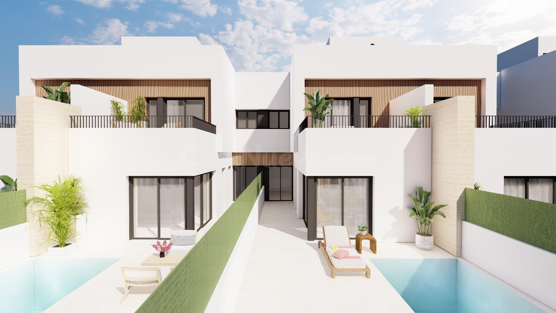 Modernas villas adosadas con piscina privada cerca del mar e