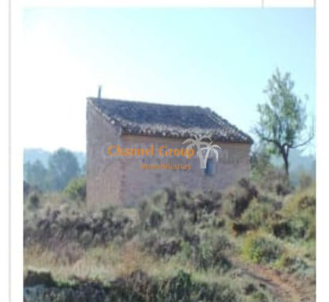 Venta de parcela rústica con Casita de piedra