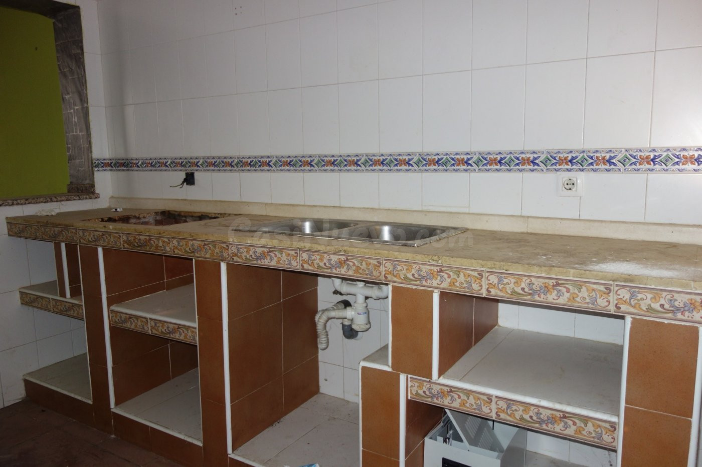 ES UNA CASA PERO SOLO SE VENDE LA PARTE DE ABAJO. TOTALMENTE