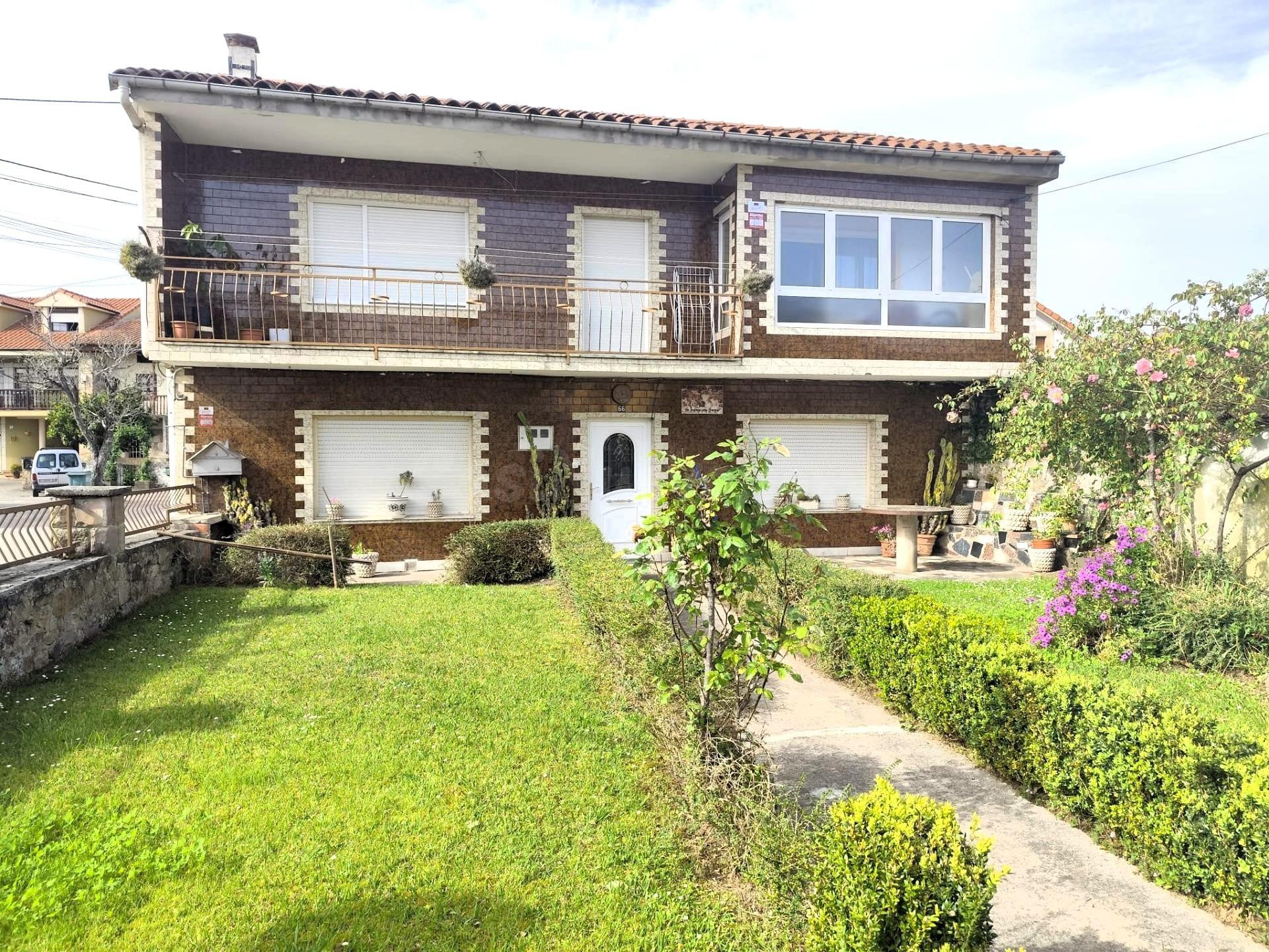 Casa con jardín en Santa María de Cayón