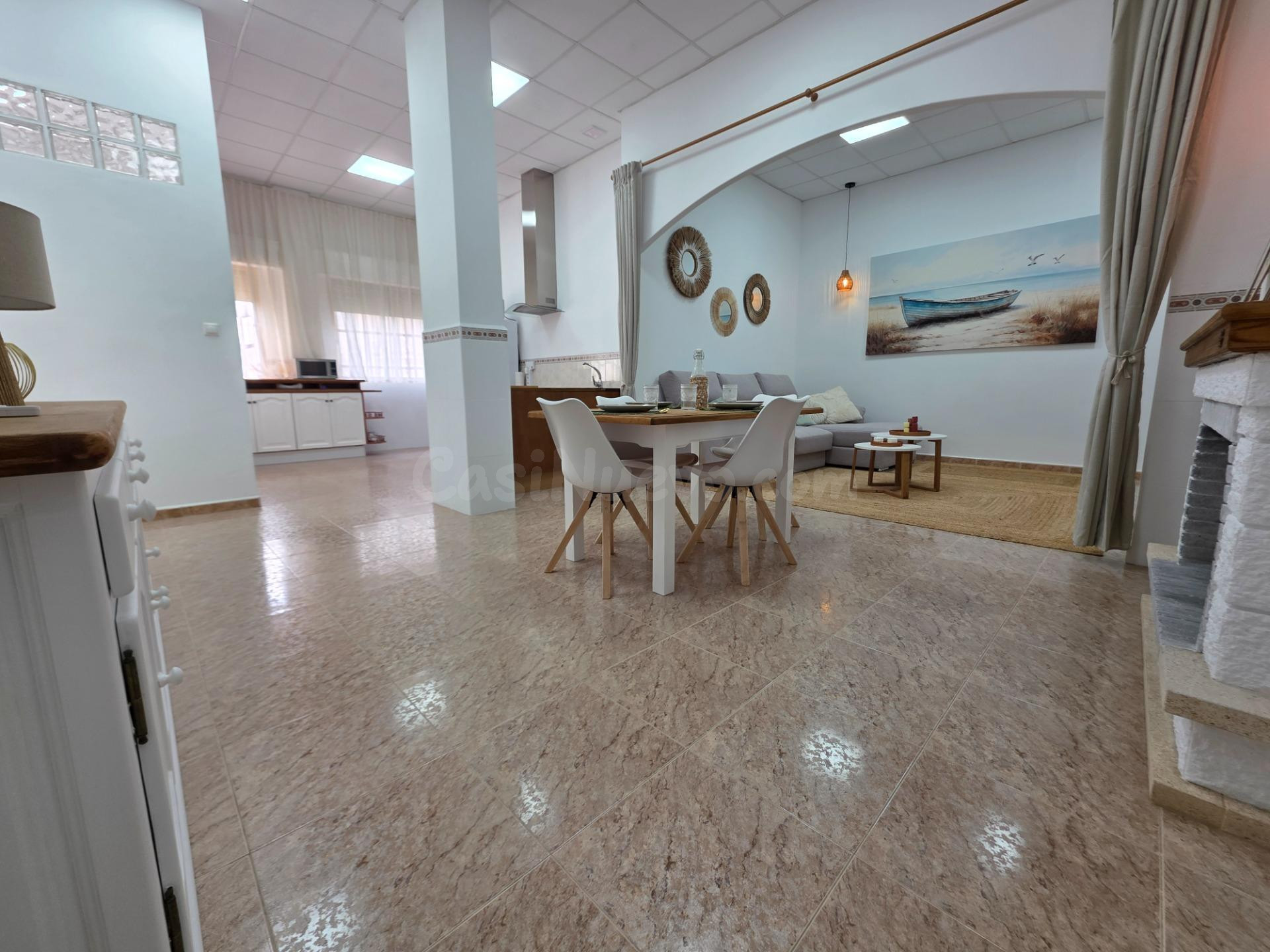 Amplia planta baja reformada con 4 habitaciones y gran garaj - foto 2