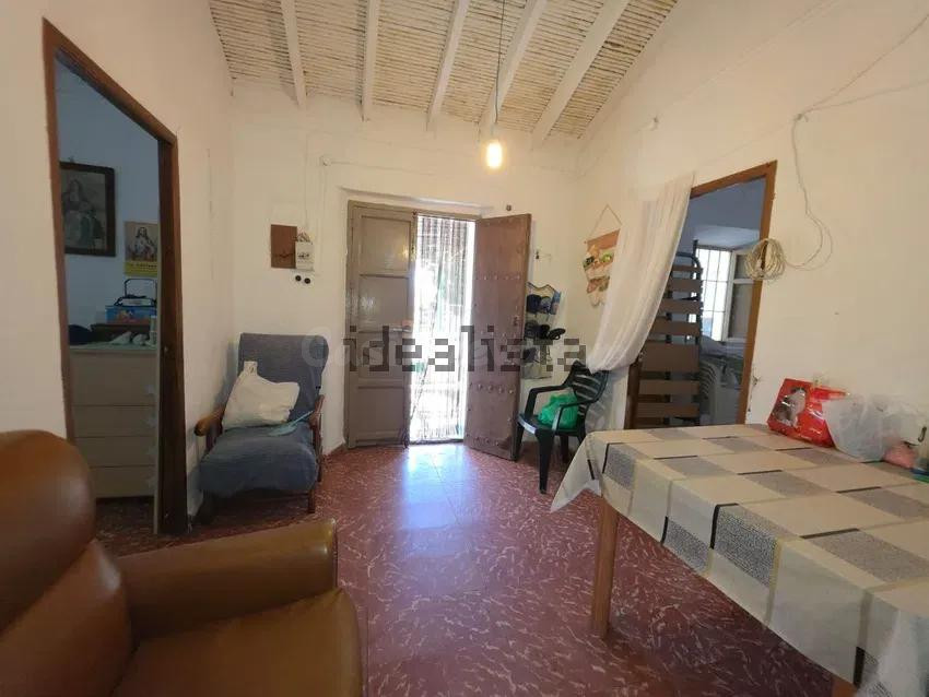 Casa de 100m2 con 2 habitaciones 1 baño con finca rústica de - foto 3