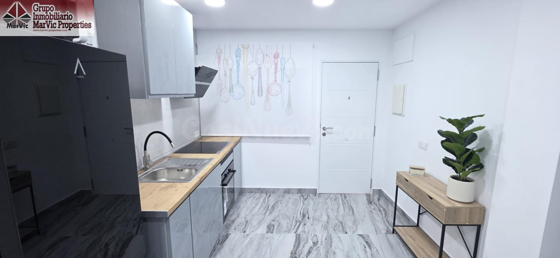 Oportunidad Única en Benidorm: Planta Baja Reformada con Pos - foto 2