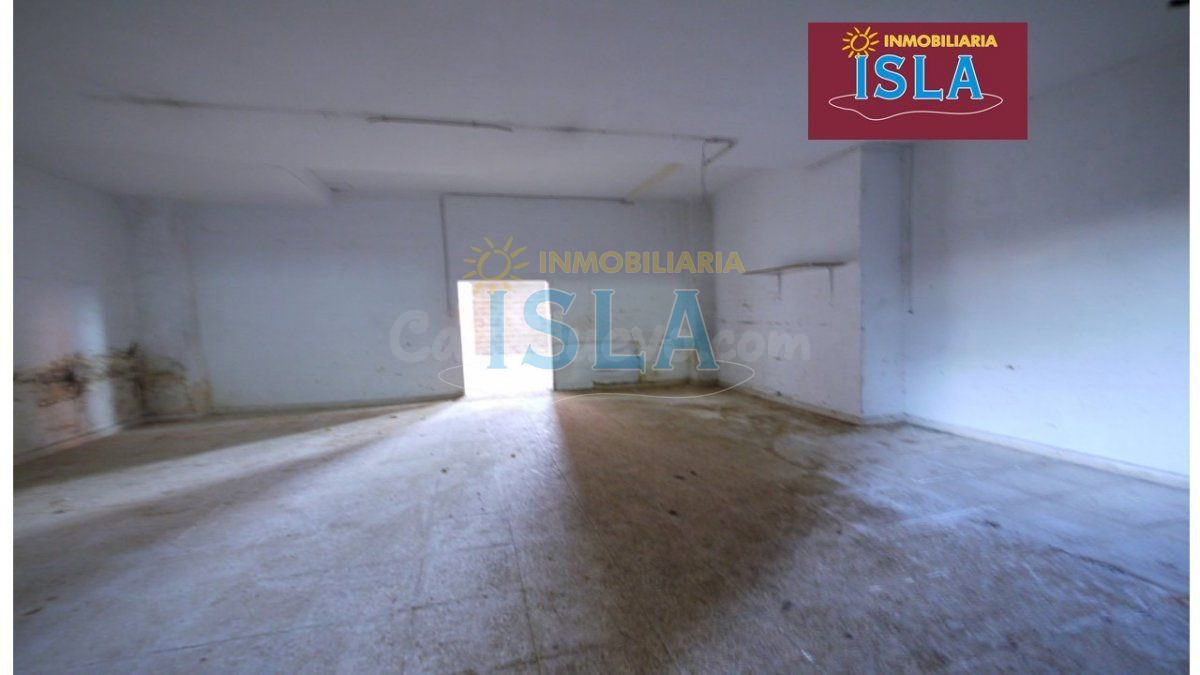 A la venta, en Limpias, dos Locales Comerciales y Nave