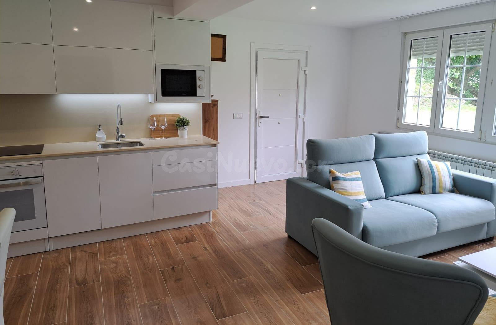 APARTAMENTO CON JARDIN Y ZONA DE APARCAMIENTO PRIVADO EN ZON - foto 3