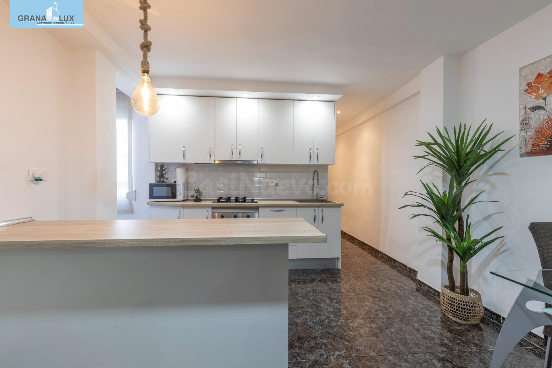 Ático reformado con ascensor, terraza y chimenea, listo para entrar a vivir