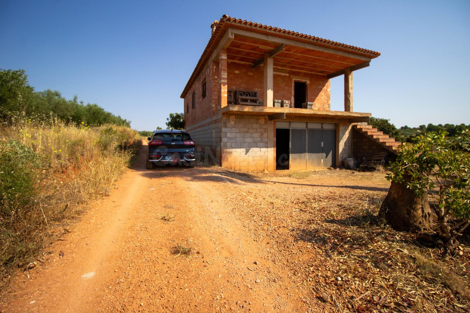VENTA DE  CASA DE CAMPO DOS TERRENOS