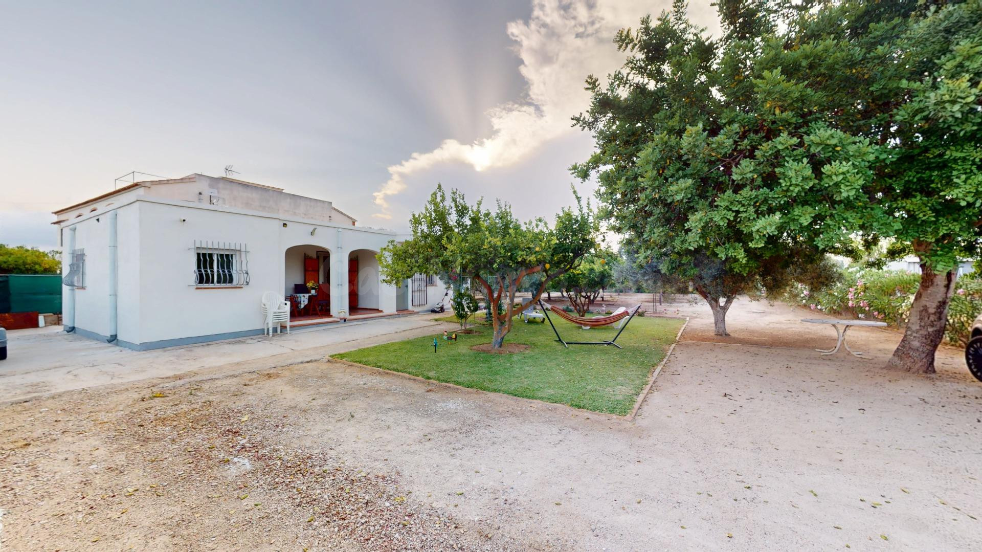 Encantador chalet con gran parcela en Oliva Playa, zona Gorg - foto 5