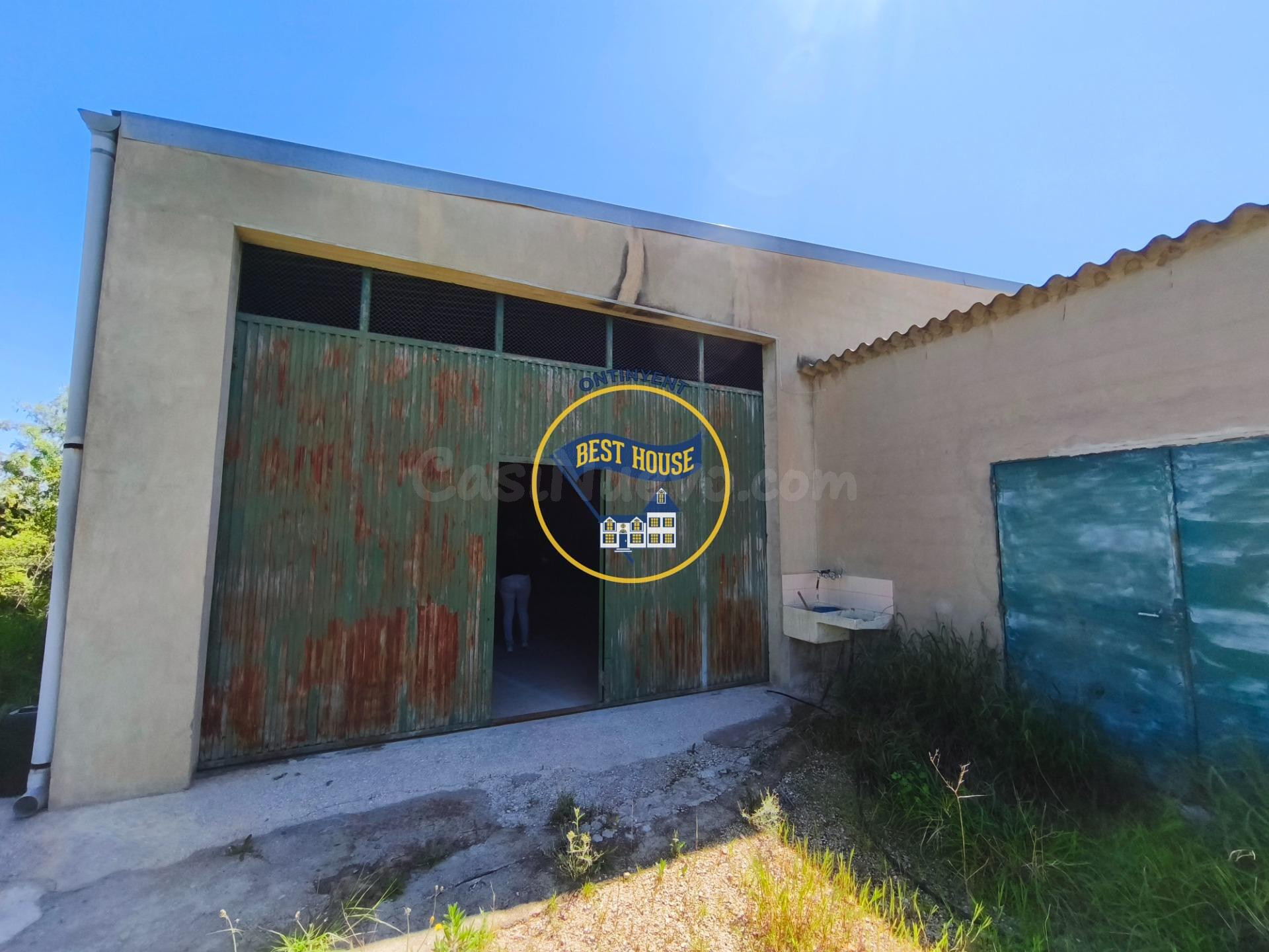 LOTE DE DOS PARCELAS DE TERRENO EN CULTIVO Y NAVE DE 224 m2 