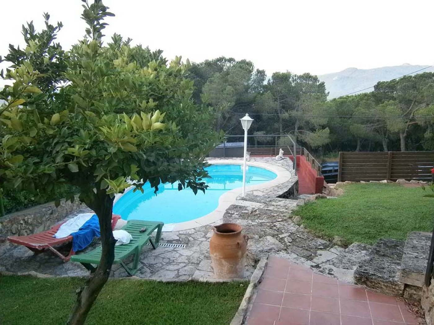 Casa en Urbanización Les Teules, reformada. Parcela de 685 m2.
