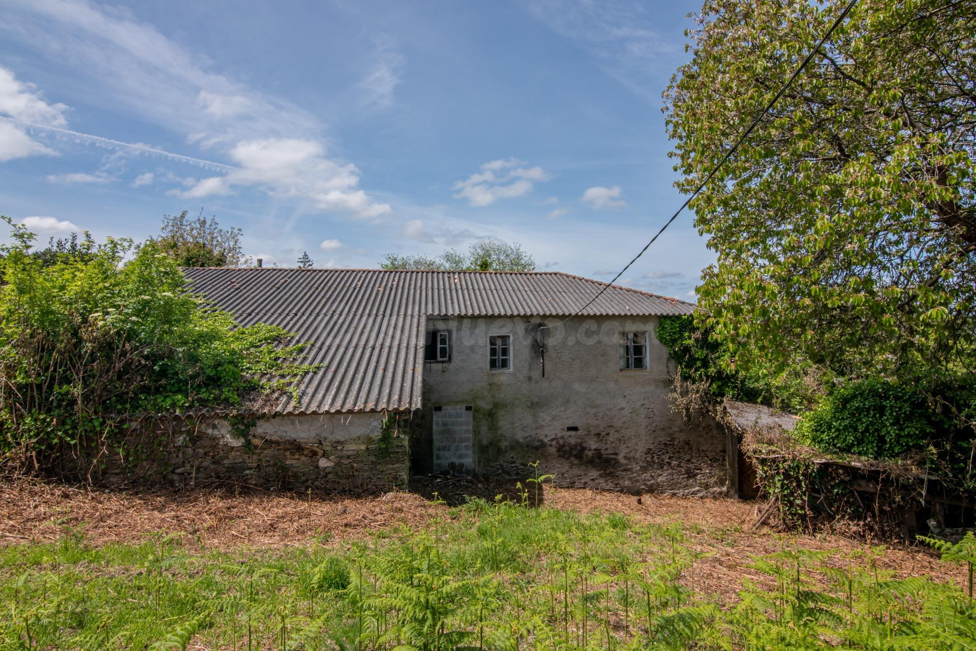 Casa de piedra para rehabilitar con finca urbana colindante - foto 4