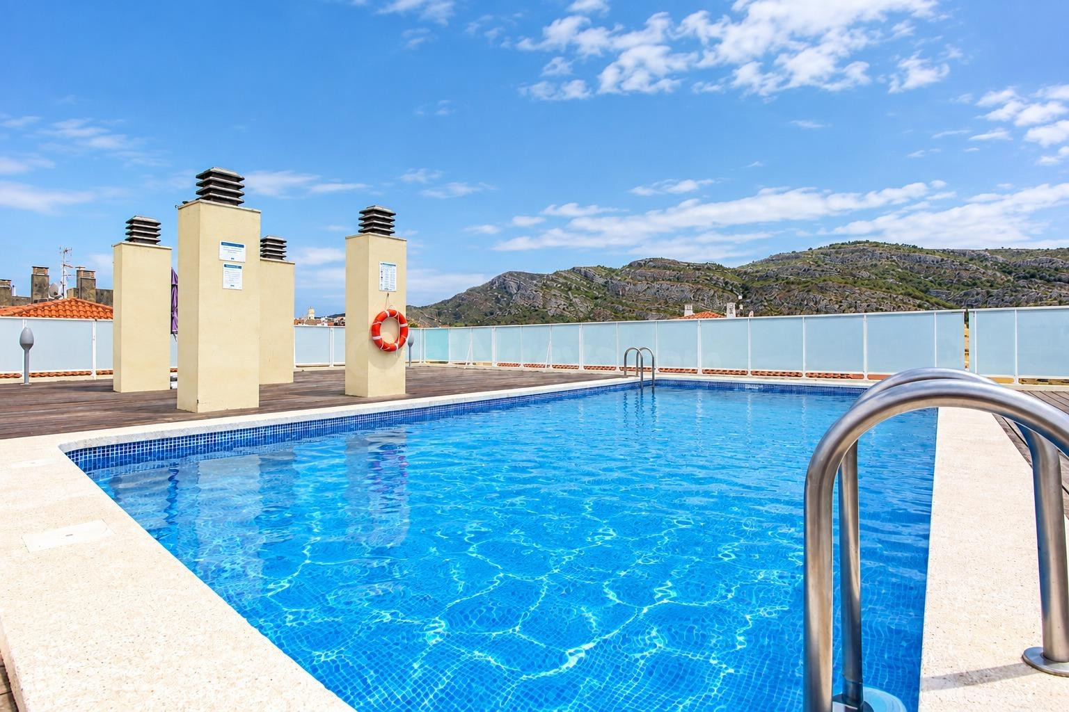 REF. 1882_APARTAMENTO DE 2 DORMITORIOS CON PISCINA Y GARAJE 