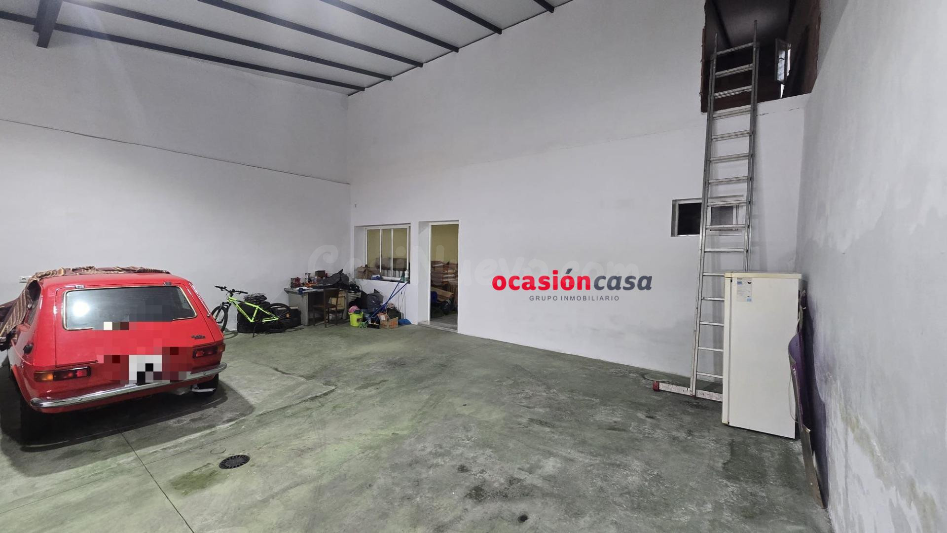 COCHERA CON SALÓN-COCINA A LA VENTA