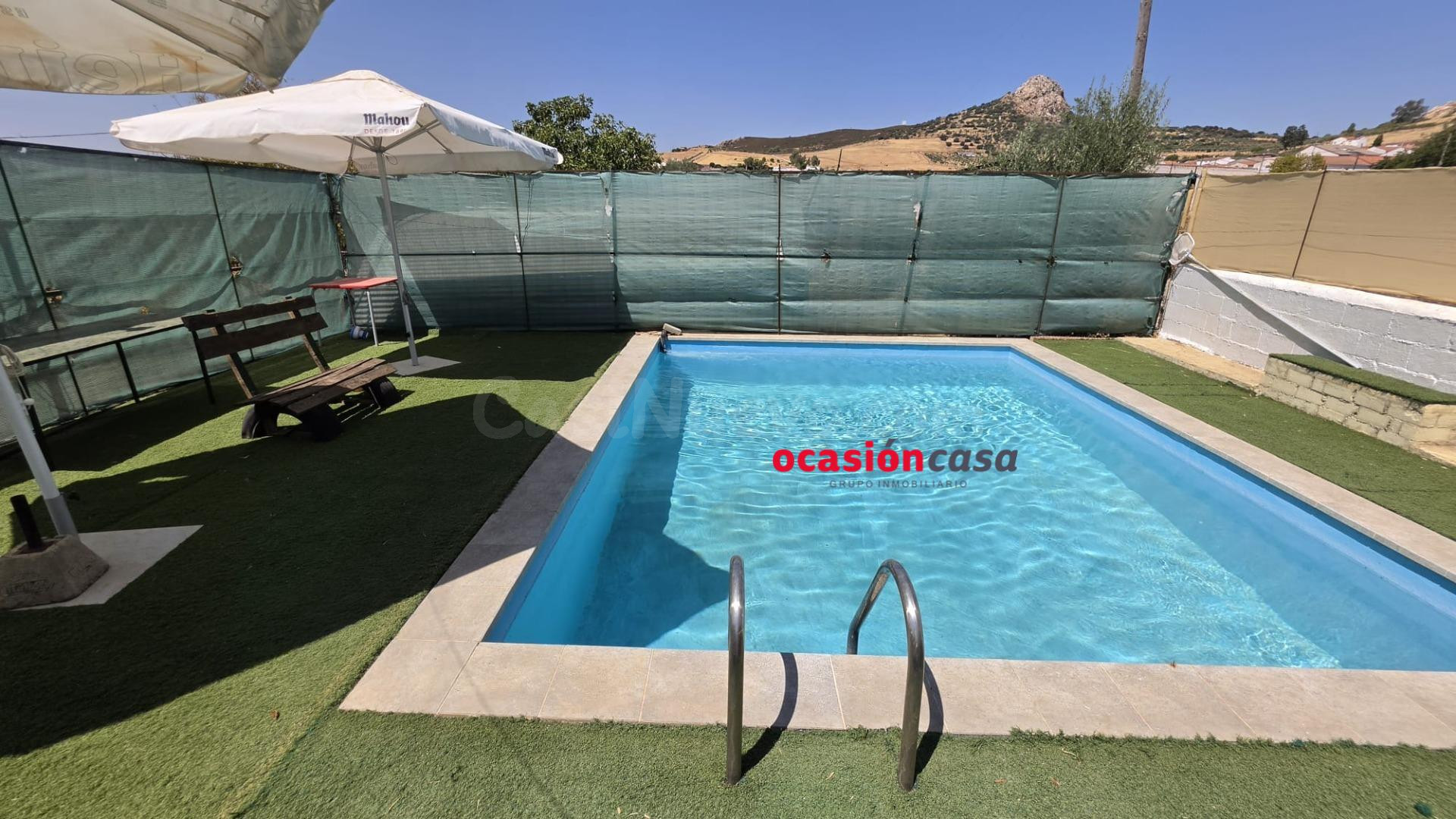 PARCELA RÚSTICA CON CASA Y PISCINA A LA VENTA