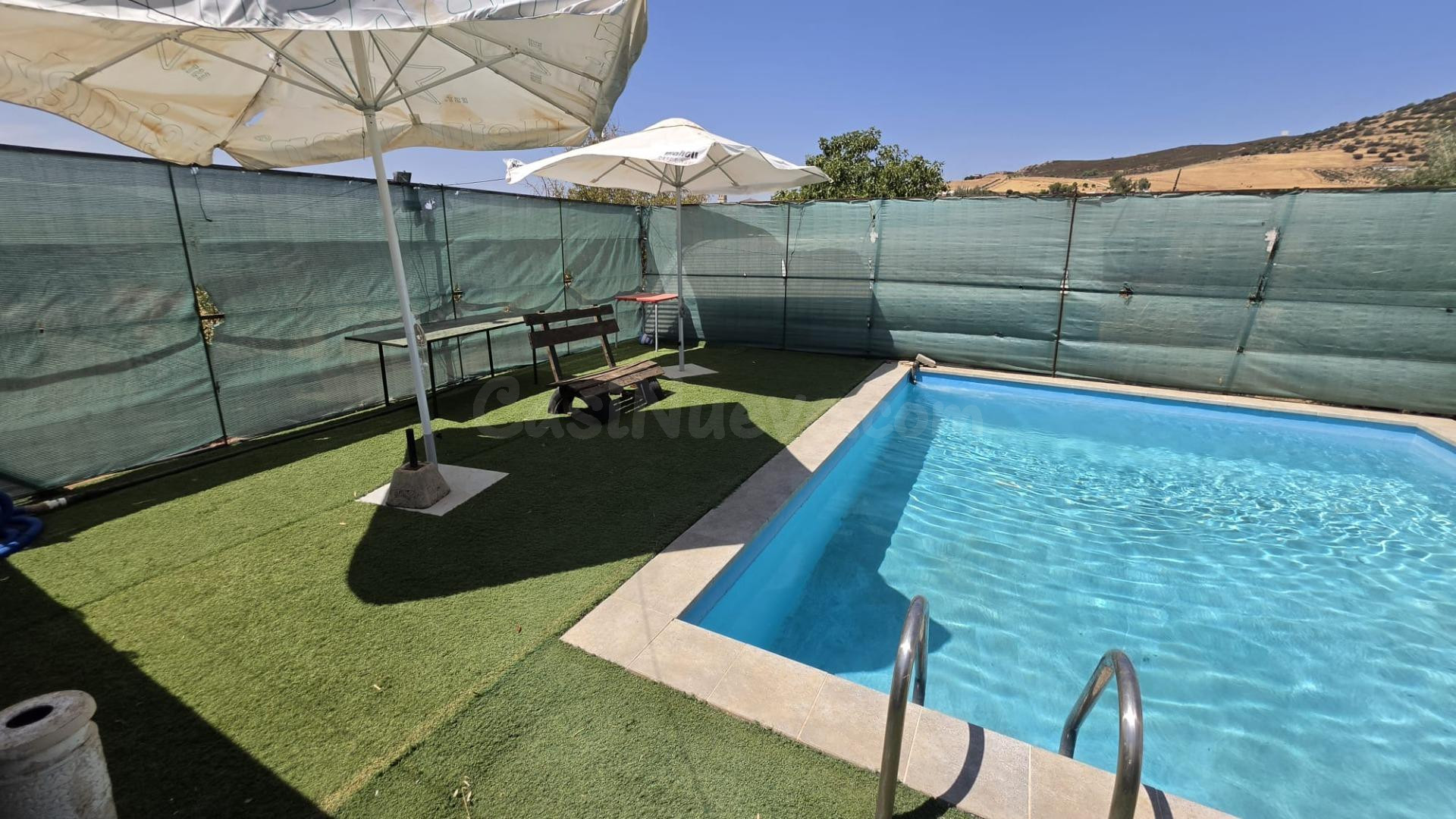 PARCELA RÚSTICA CON CASA Y PISCINA A LA VENTA - foto 2