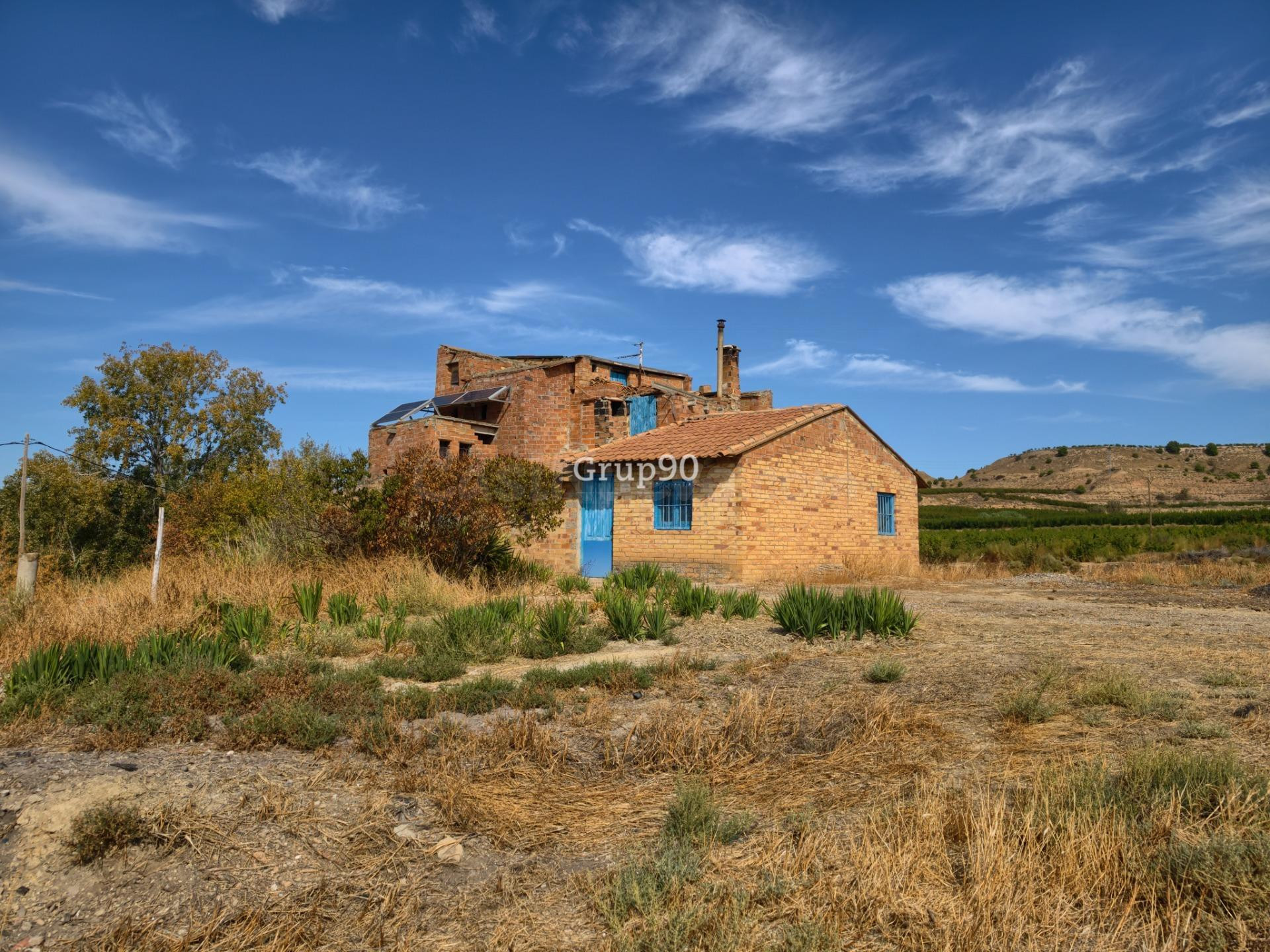 TERRENO DE 7.274 m2 CON CASA A REFORMAR, A 10 MINUTOS DE LLE