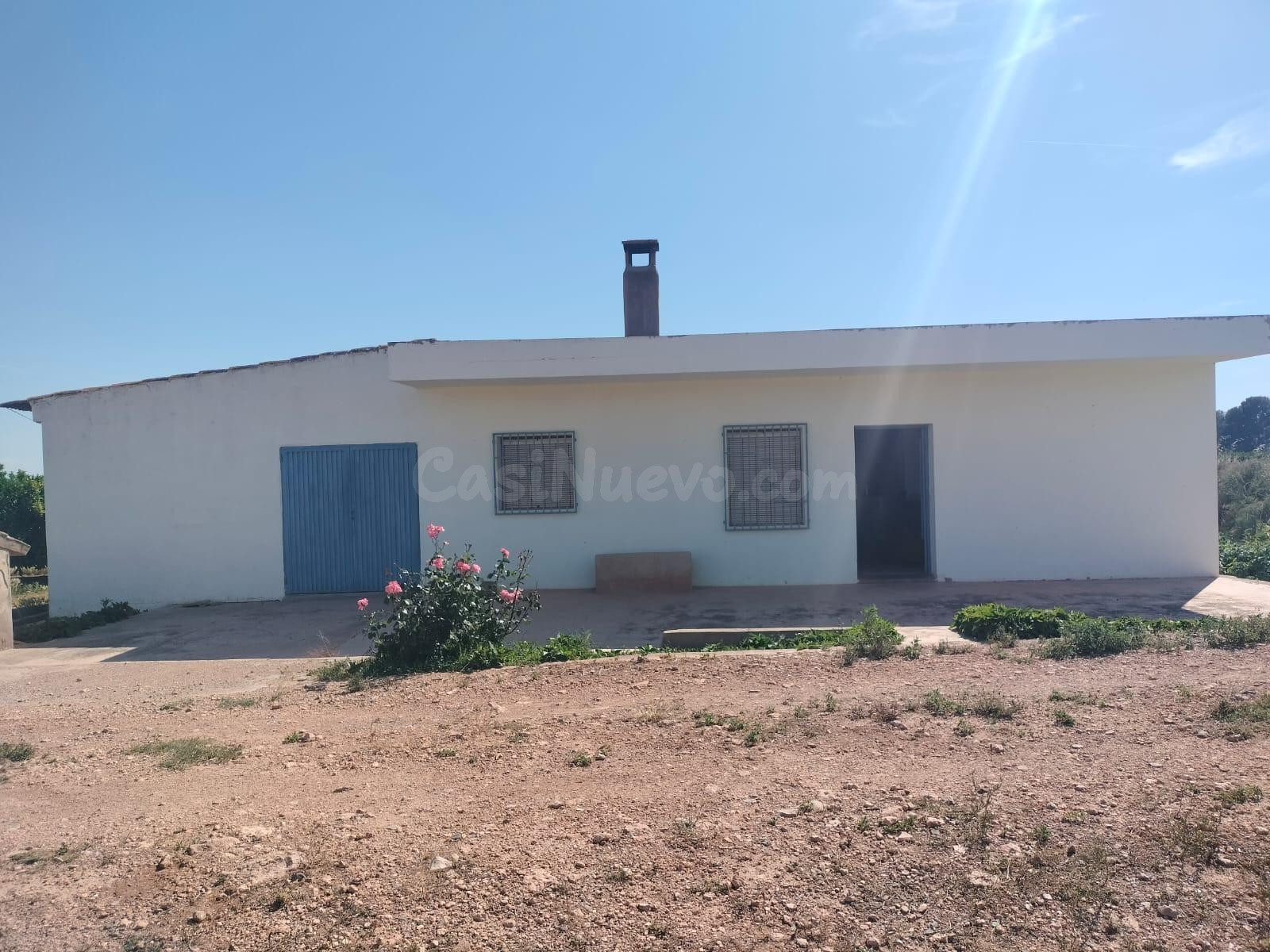 CASA DE CAMPO CON NARANJOS EN PRODUCCIÓN