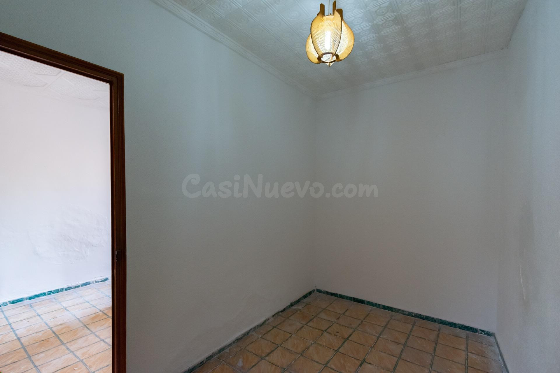 Casa con patio y almacén con doble acceso de entradas en San - foto 5