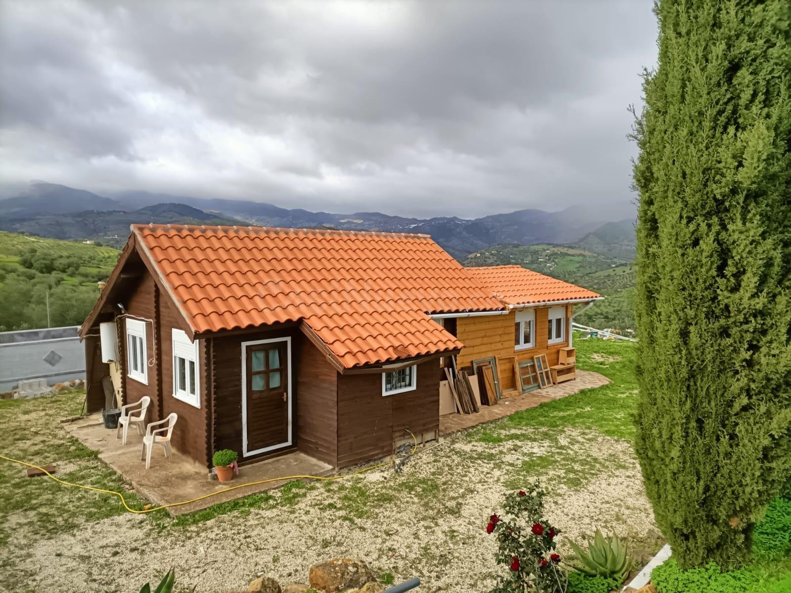 Terreno con casa de madera en Tollox, Malaga
