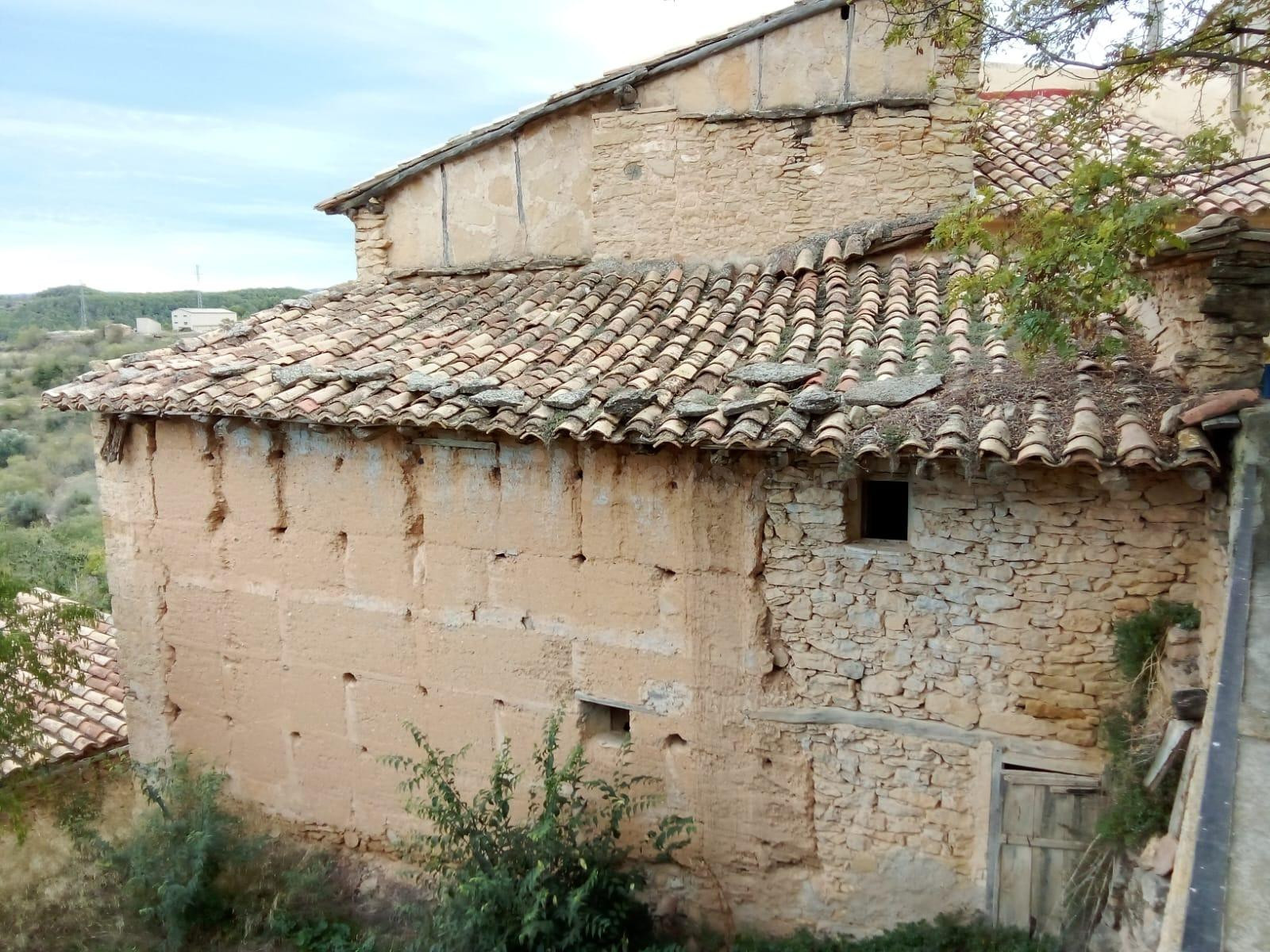 Casa a rehabilitar con jardín