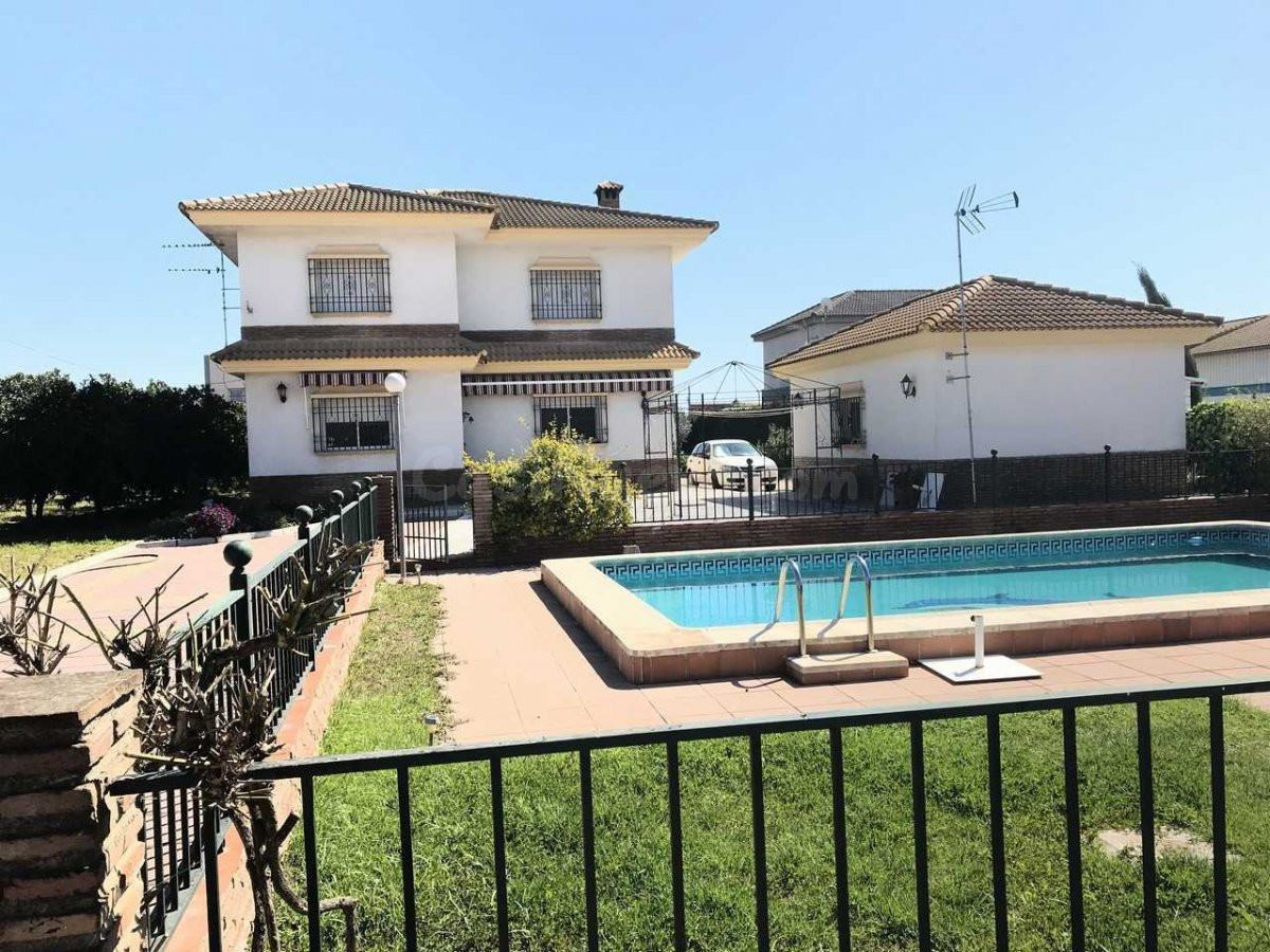 higueron - Parcela de 3.000m2  con casa y apartamento.