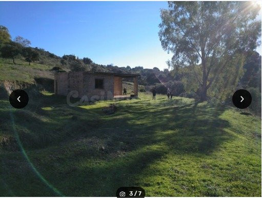ZONA CUEVAS BAJAS. Parcela de 6.000 m2, vallada con casa en construcción 65 m2
