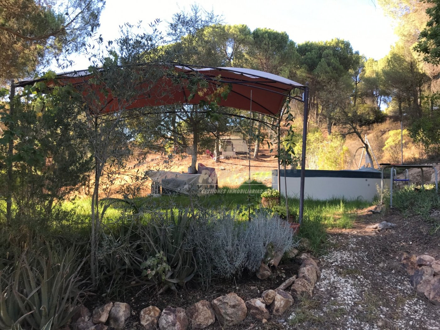 ZONA TORRE HORIA-TRASSIERRA -Parcela de terreno con pozo comunitario, piscina y remolque tienda.
