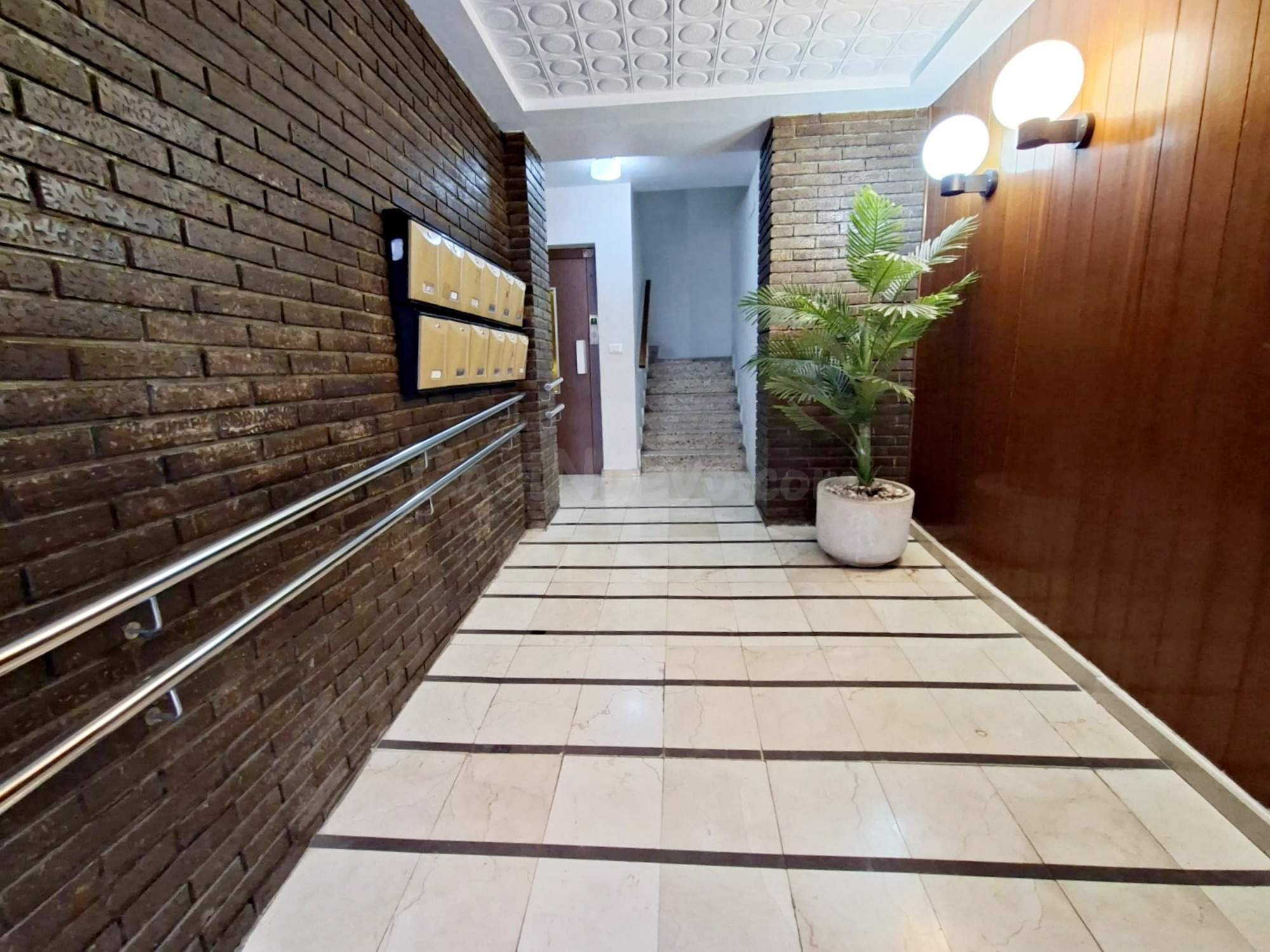 137 m2 en el centro con balcón a la calle principal