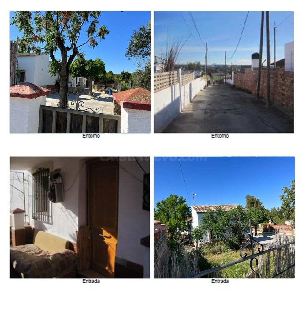 CASA OKUPADA  EN VENTA CON TERRENO EN URBANIZACION