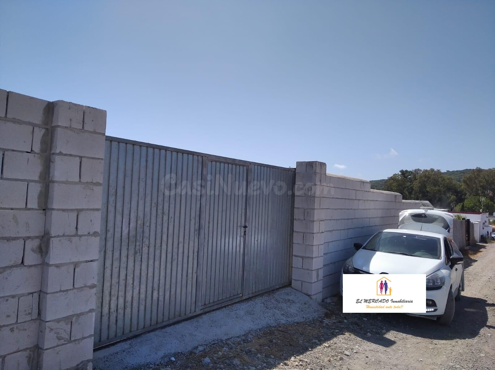 PARCELA CON CASA