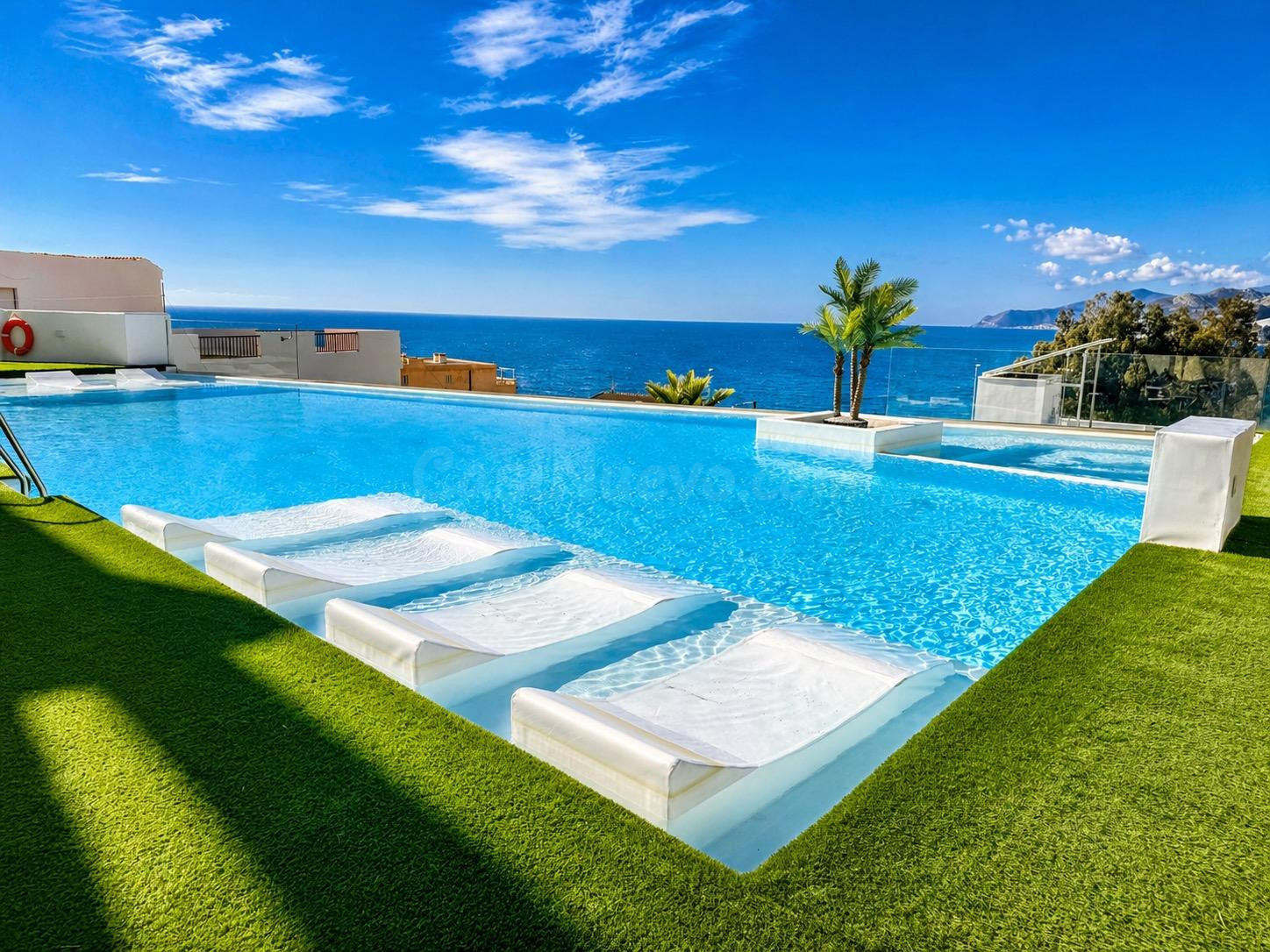 Apartamento premium en Melicena con vistas al mar y piscina infinita