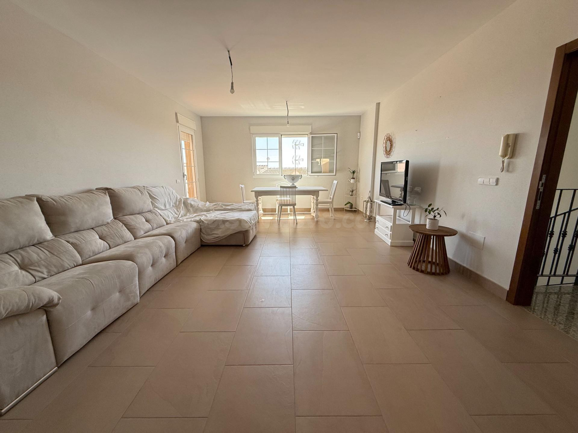 Vivienda sobre pilares en Roldán