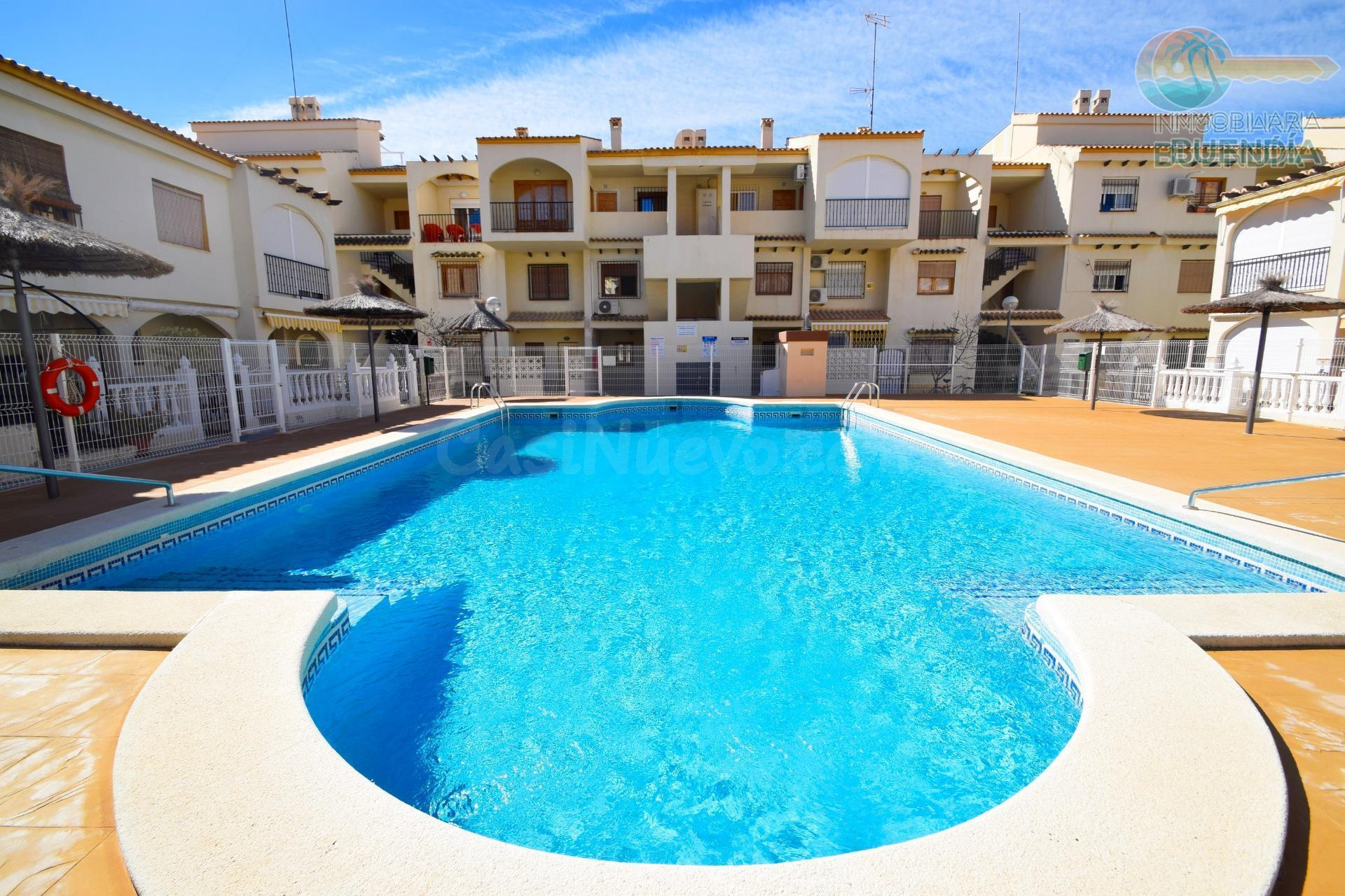 APARTAMENTO EN PLANTA BAJA EN RESIDENCIAL CON PISCINA COMUNITARIA