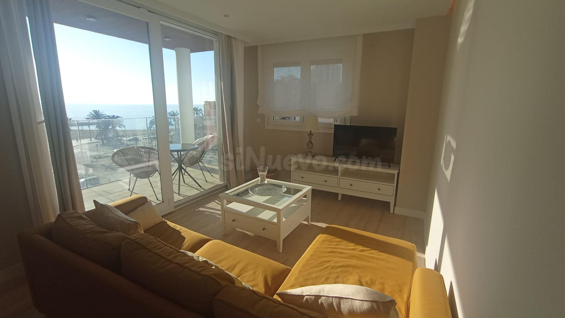 BONITO PISO FRENTE AL MAR CON PISCINA COMUNITARIA Y PARKING  EN PASEO MARITIMO DE VINAROS