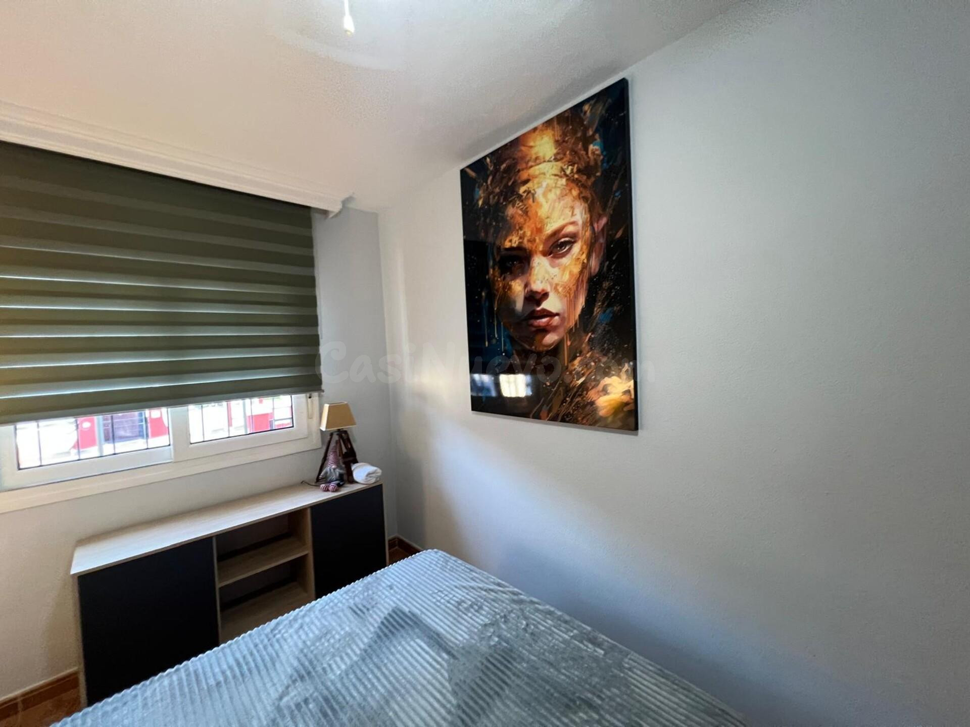 Chalet adosado en Orihuela Costa con piscina, jardín y terraza soleada