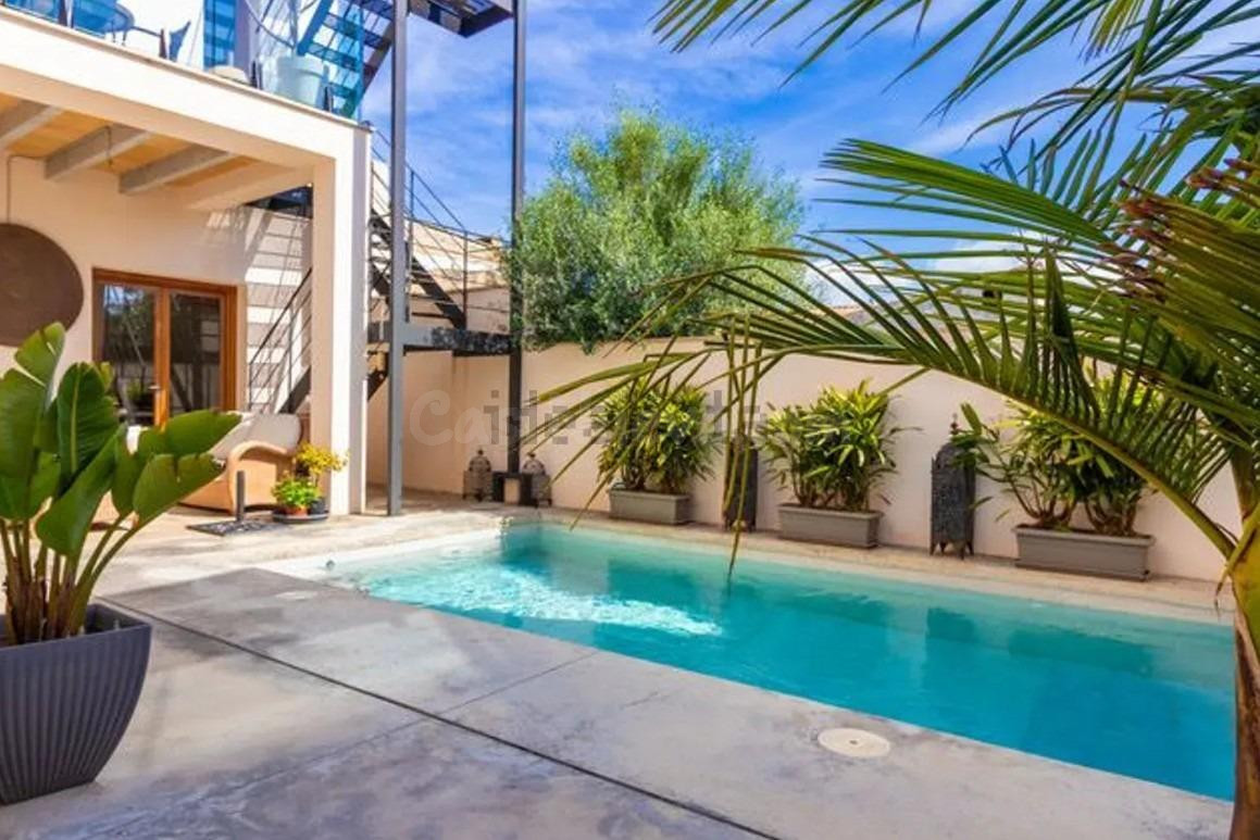 Casa con piscina en Muro