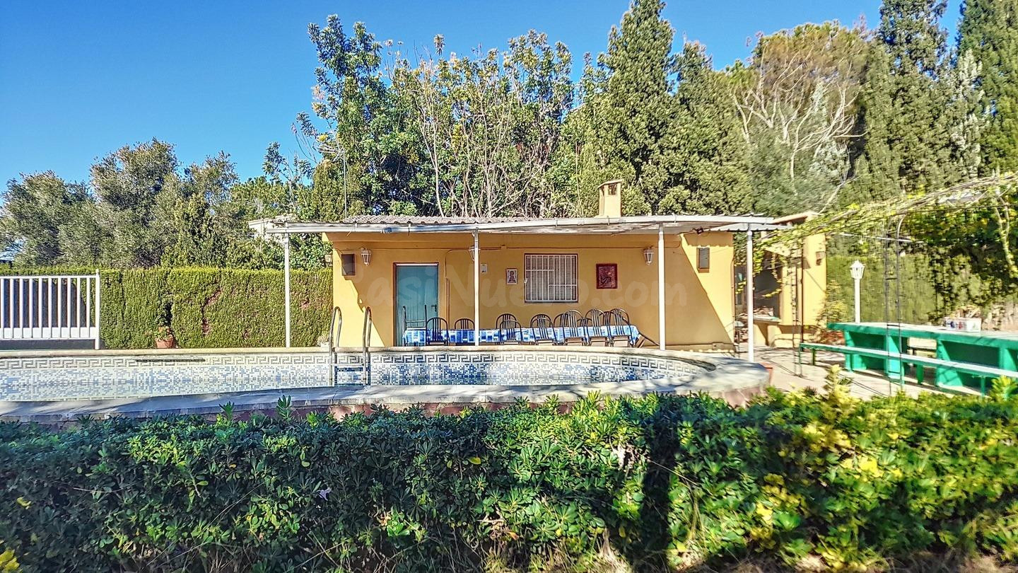 TERRENO RUSTICO CON CASA