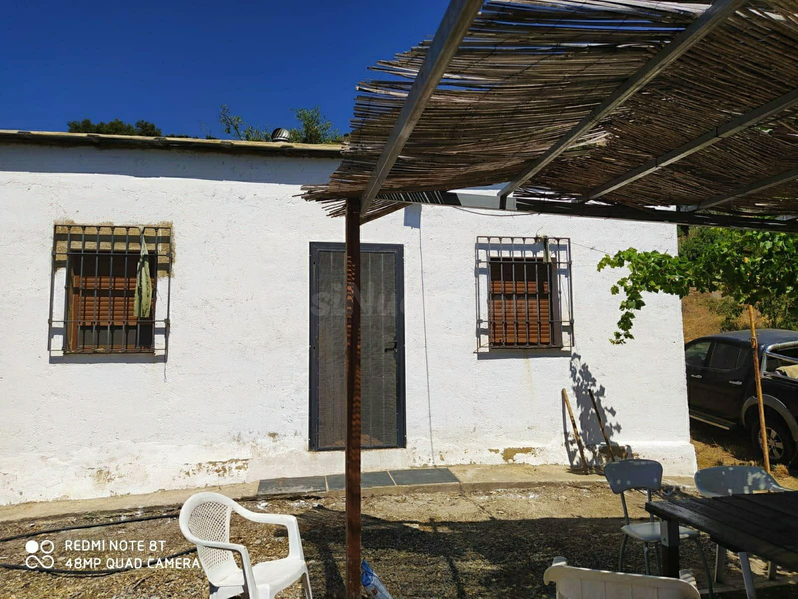 VENTA DE CASA-CORTIJO CON TERRENO EN LA ALPUJARRA GRANADINA. Término de Cástaras – Pago de La Perla