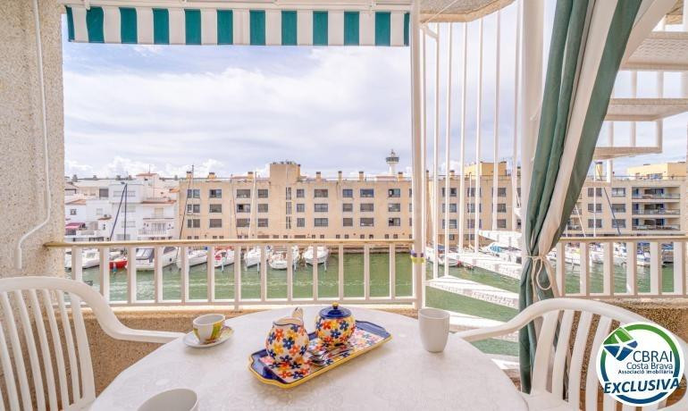 PORT MOXÓ Encantador apartamento de 2 dormitorios con vistas al canal, solárium y parking privado exterior
