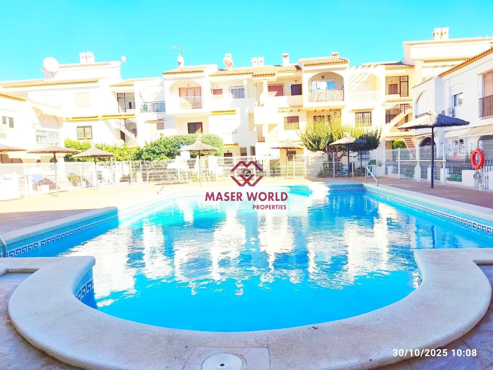 APARTAMENTO EN PLANTA BAJA CON PISCINA COMUNITARIA