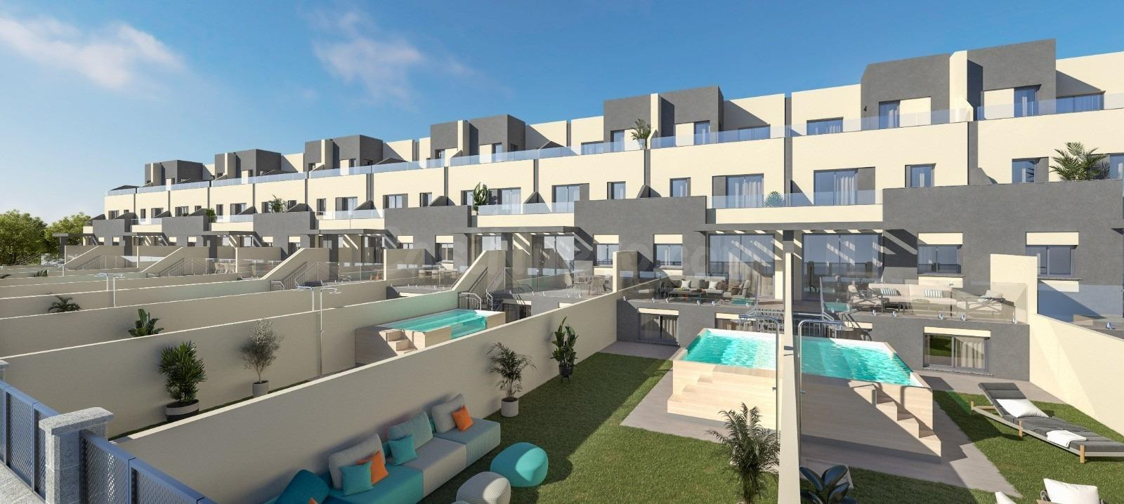 12 viviendas adosadas de 4 dormitorios uno de ellos en planta baja, 4 baños completos y 1 aseo