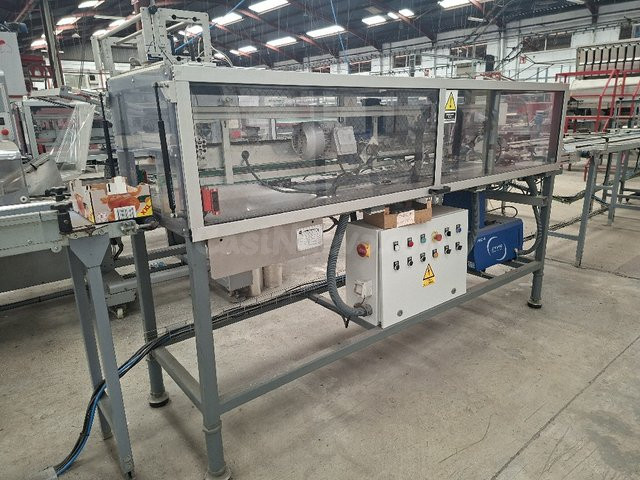 Máquina profesional para pegar bandejas en Castellón