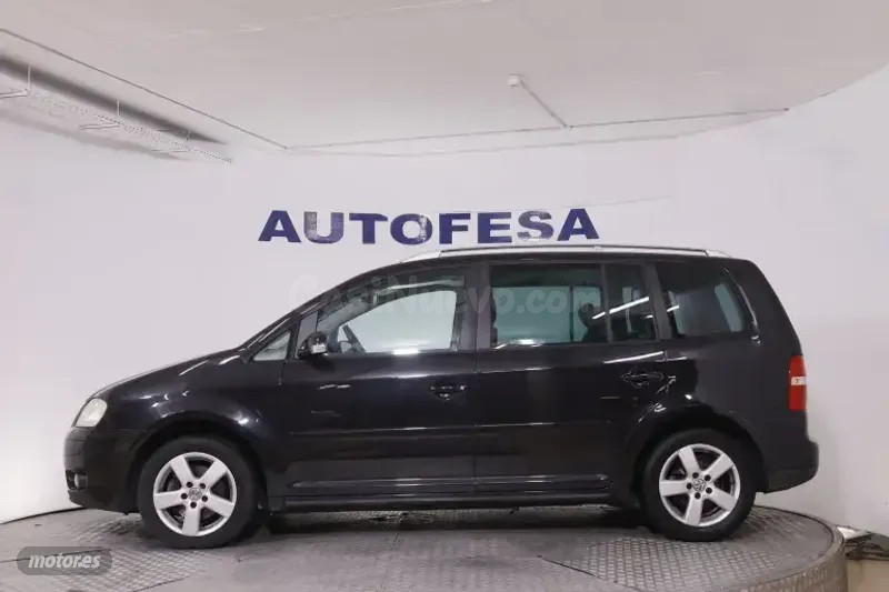 Volkswagen Touran - foto 5