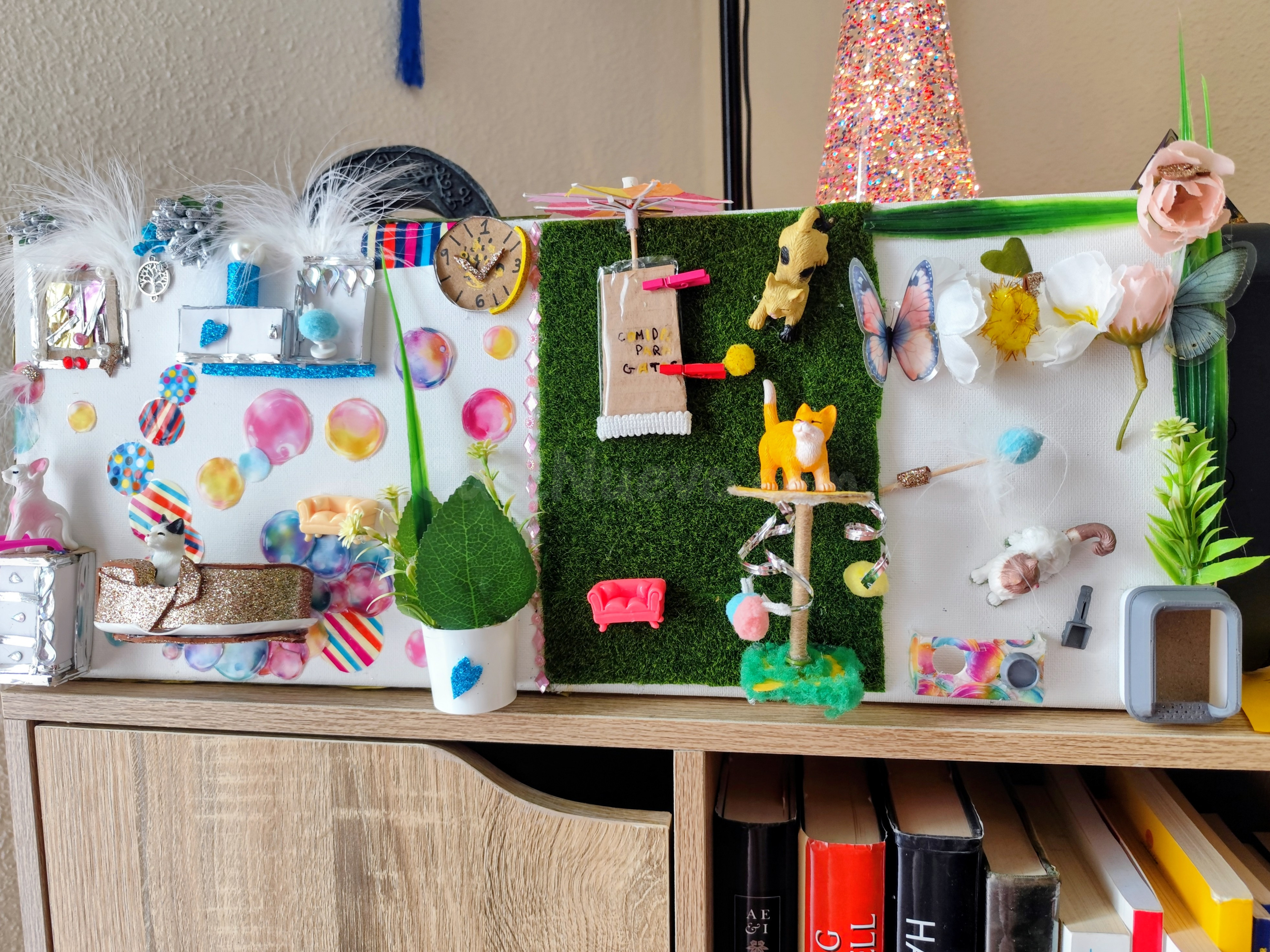 Diorama de gatos