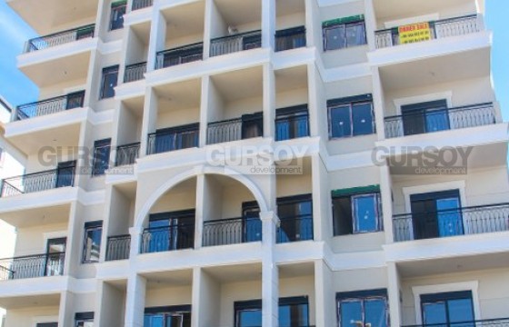 Три новые квартиры в 800 м от моря в районе Джикджилли, 49-118 м2 в Турции - фото 12