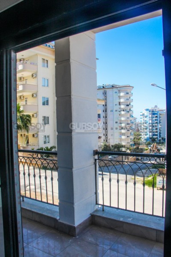 Три новые квартиры в 800 м от моря в районе Джикджилли, 49-118 м2 в Турции - фото 1