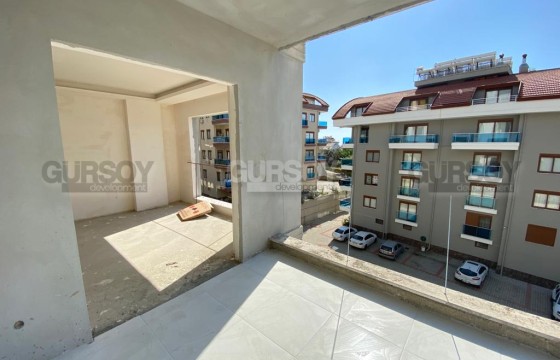 Просторная квартира  в новом доме в районе Хасбахче. 3+1,95м2 в Турции - фото 12